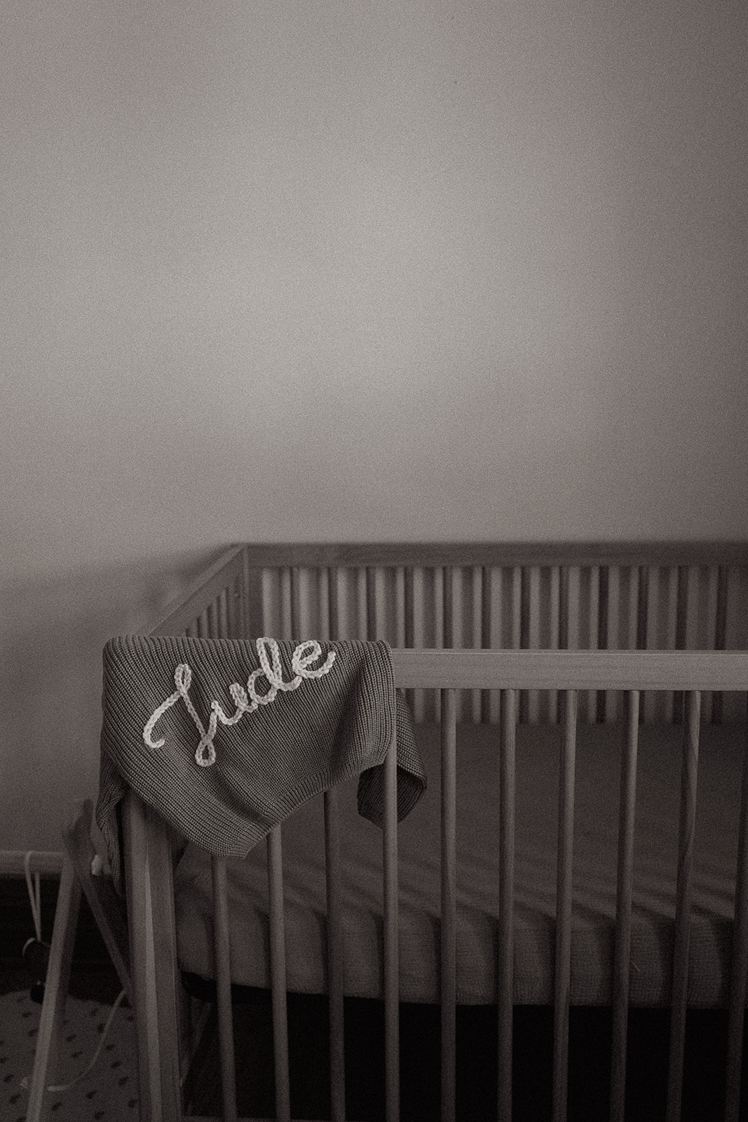 family welcoming their baby during professional newborn photography session