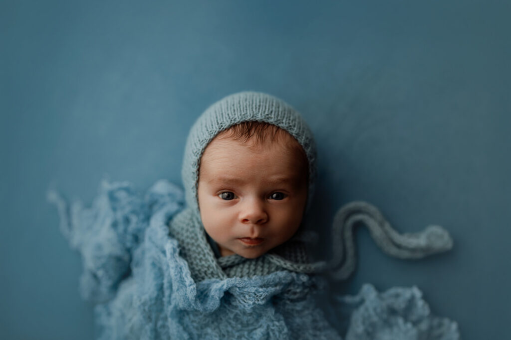 awake newborn baby during studio newborn photography session
